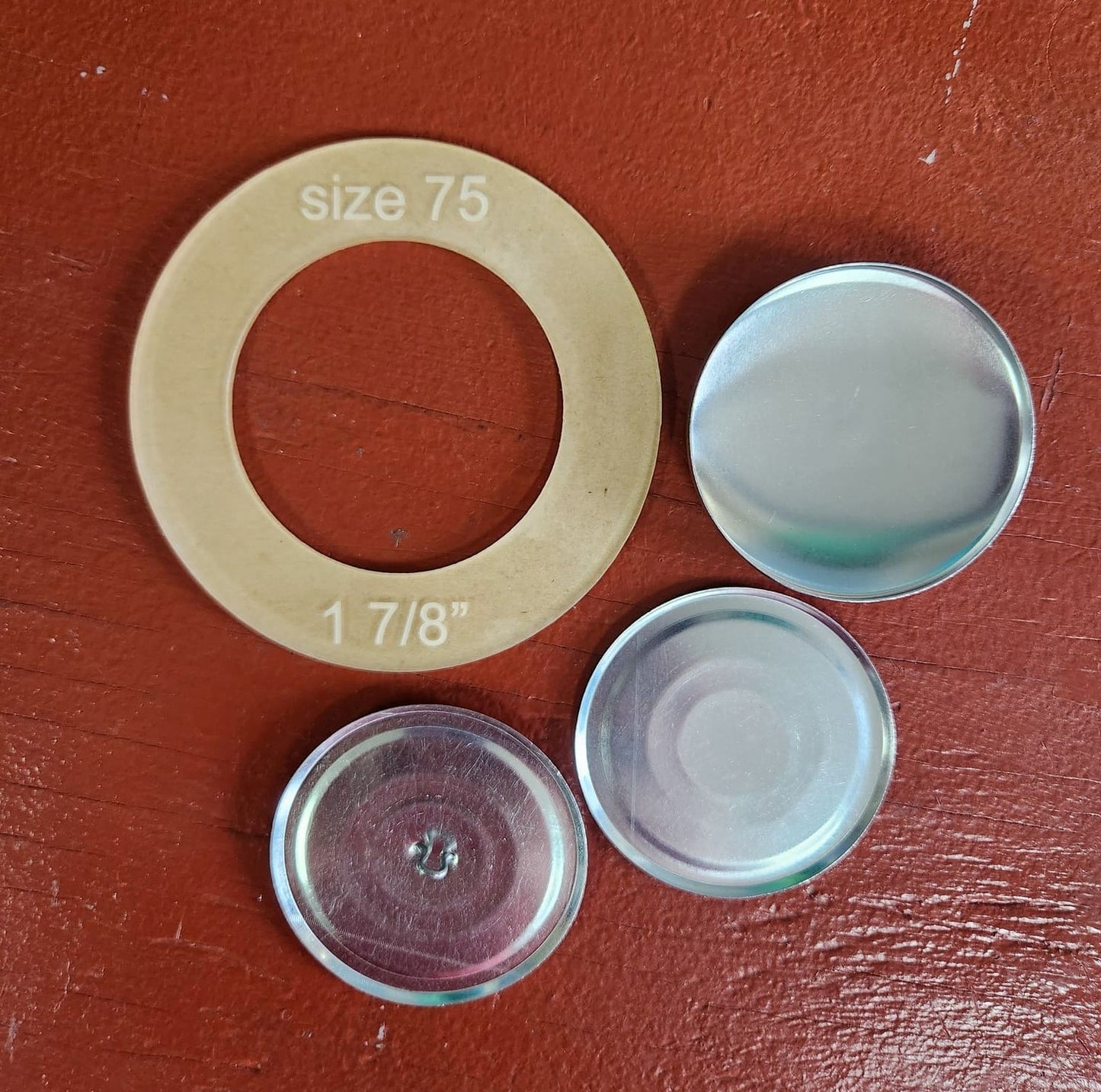 Size 75 two-part aluminum coverbutton with template