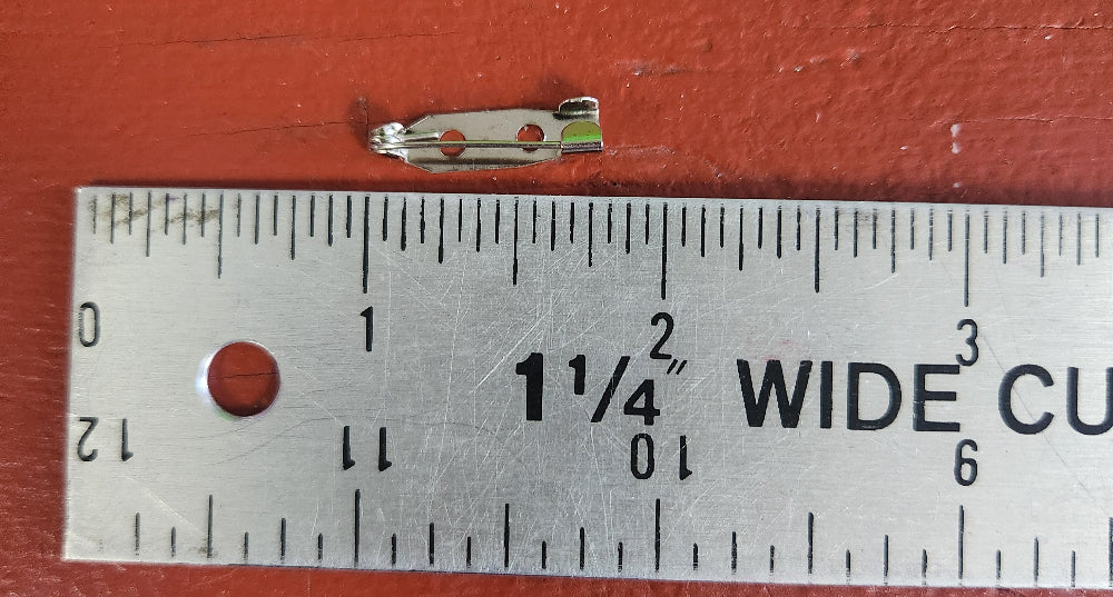 three-quarter-inch pin clasp