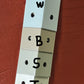 Four shades of light-colored 2-inch capri clips