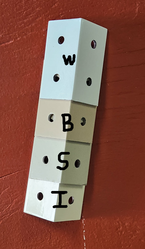 Four shades of light-colored 2-inch capri clips