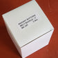 Box of one dozen 1 inch two-part aluminum cover buckles with templates and tongs